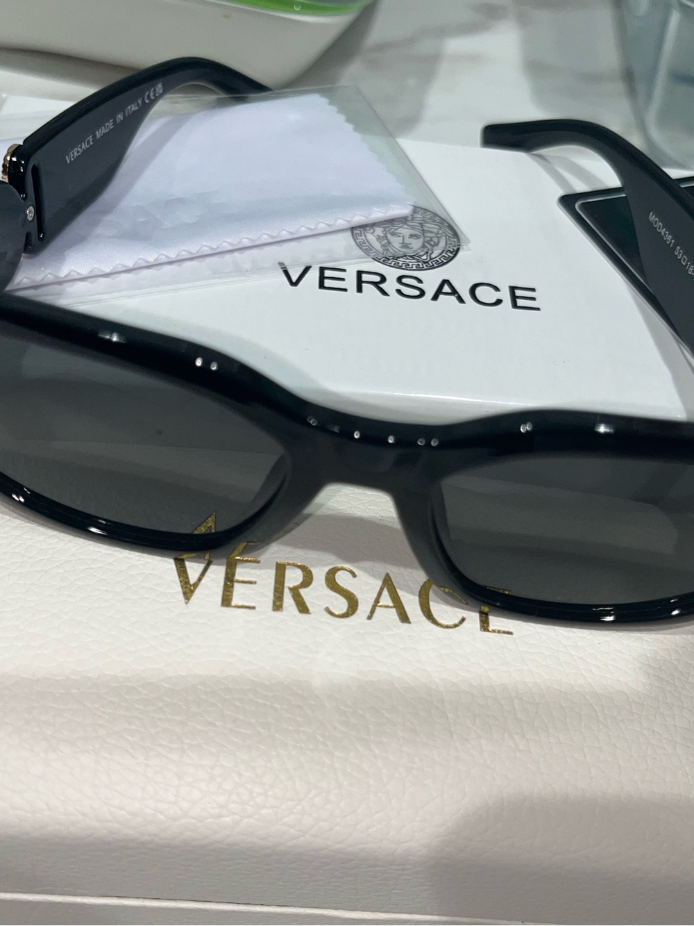 Versace Black Frame Sunglasses with Dark Lenses